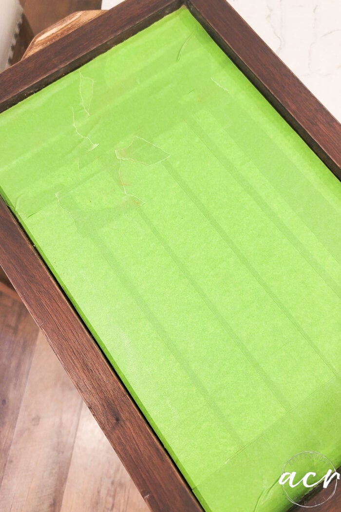 wood tray with green tape