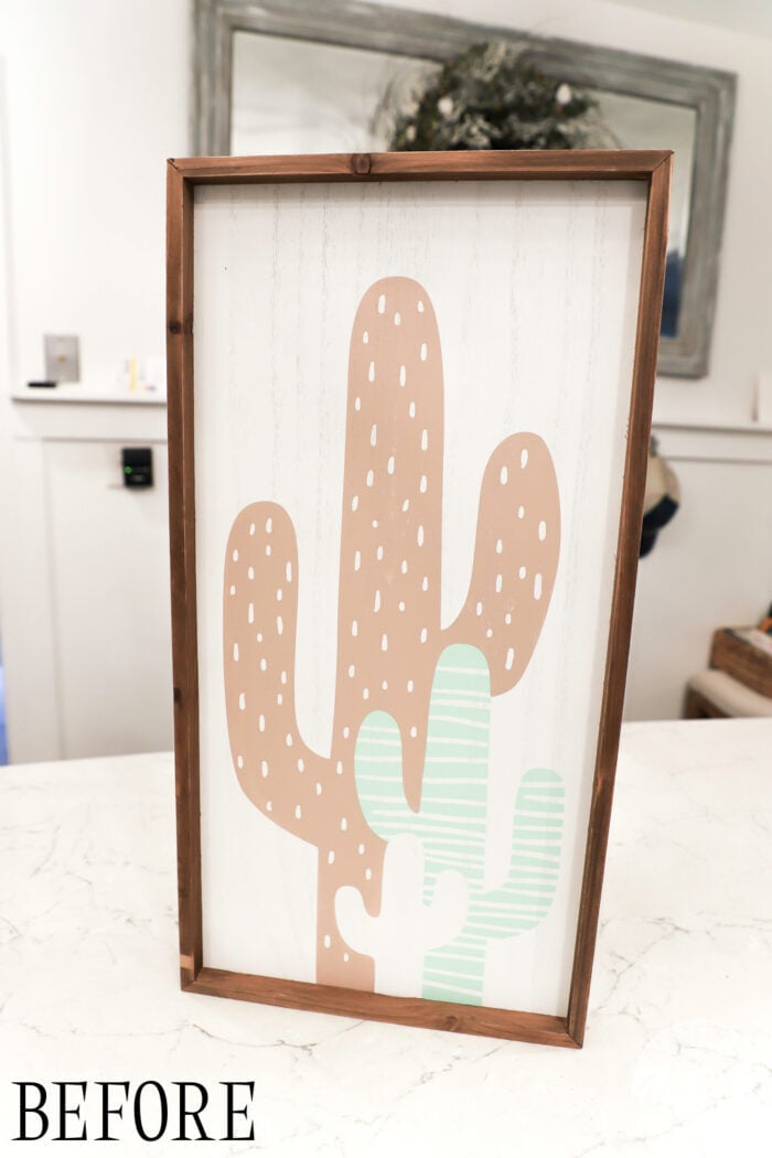 wood framed sign with cactus print