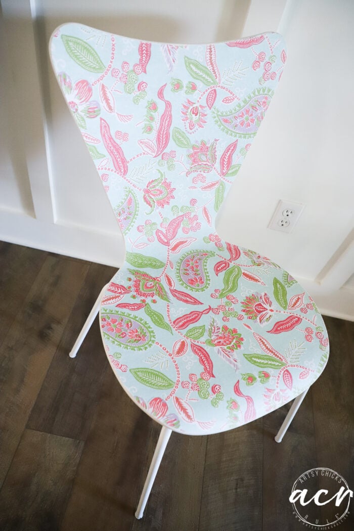 pink, green and blue mcm chair