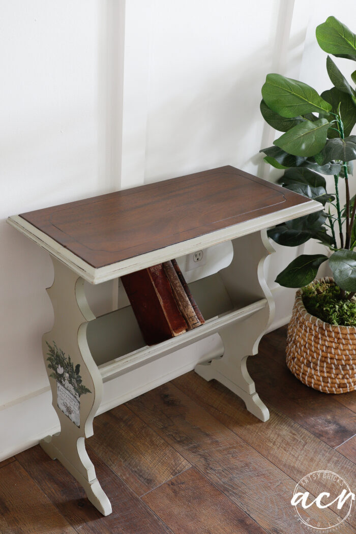 green table stained top with books on ledge