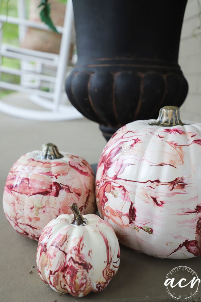 3 marbled pumpkins on porch