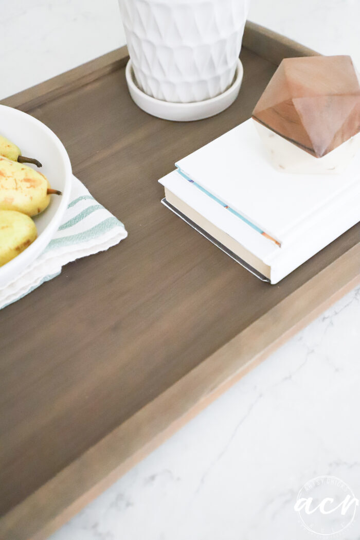 wood tray up close with decor