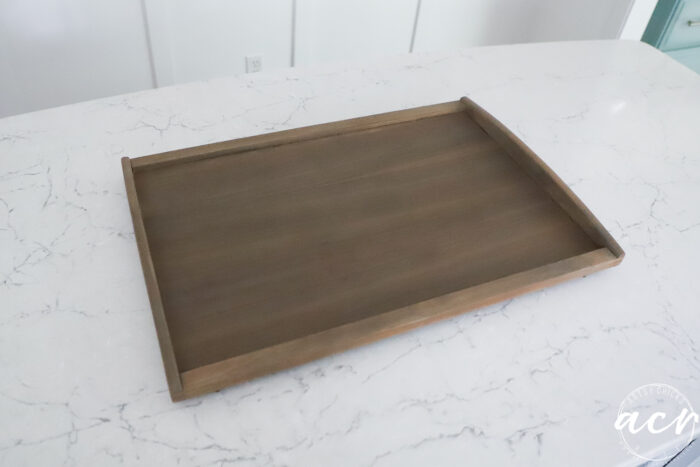 wood tray stained with classic gray on white countertop