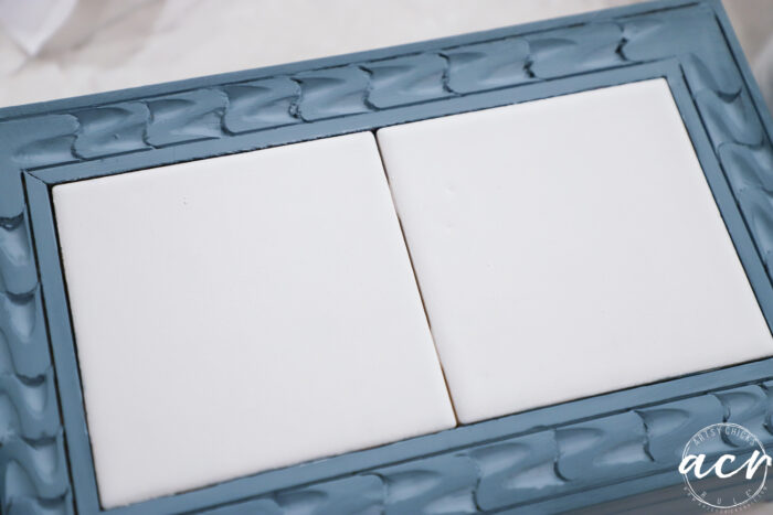 top of box where tiles are painted white