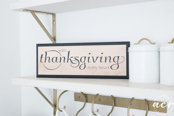 thanksgiving sign on white quartz shelf