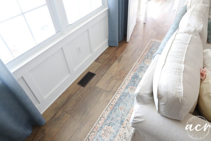 white board and batten with brown wood floors