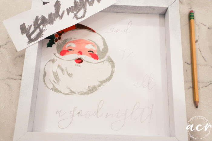 santa decoupaged on sign and ink transferred the letterng