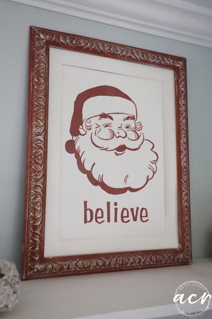 red and white santa sign