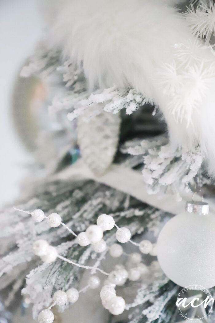 white sprigs and ornaments up close