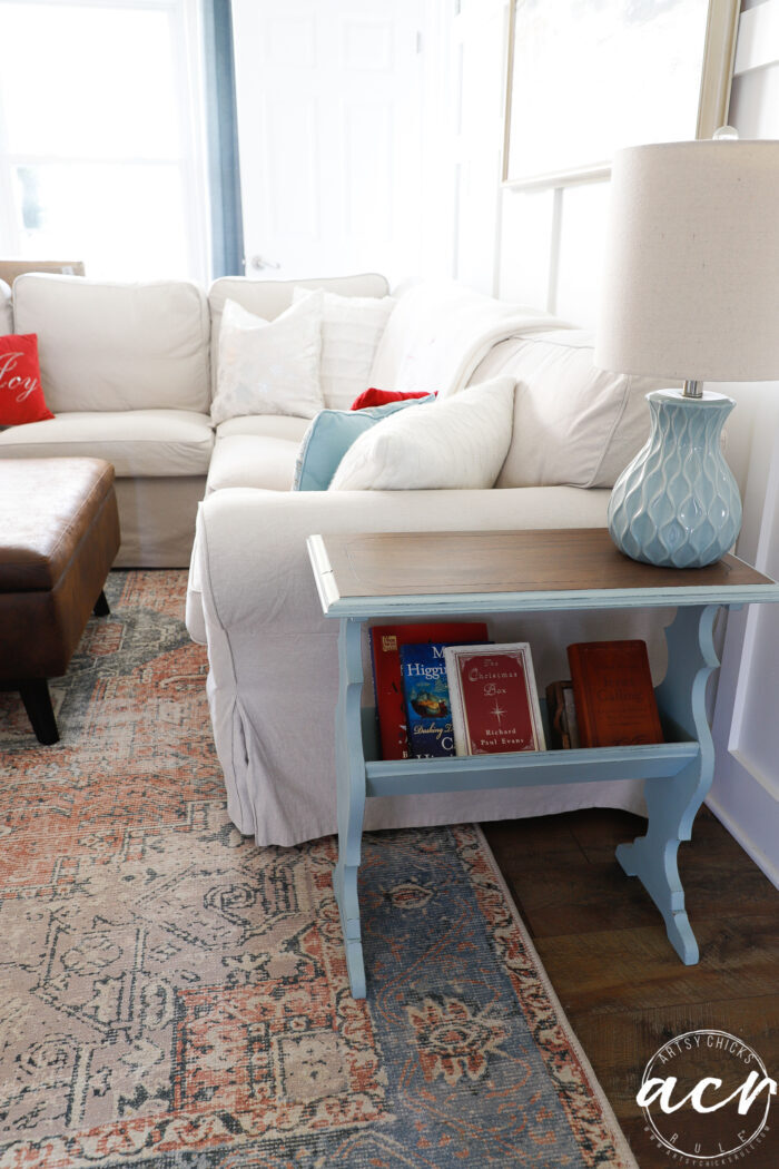 blue side book table in living room