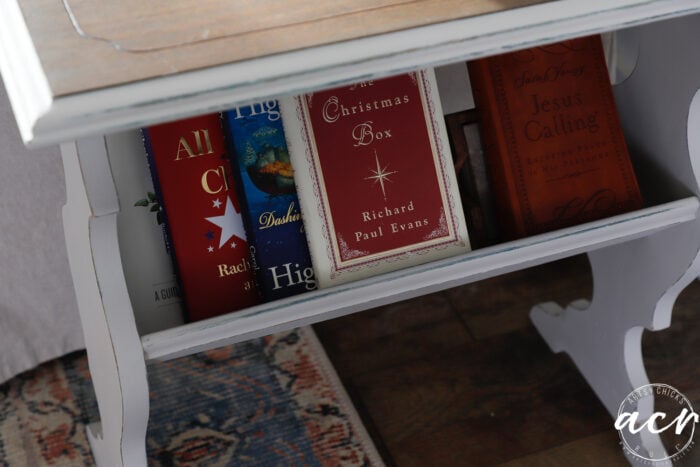 side book table books on shelf