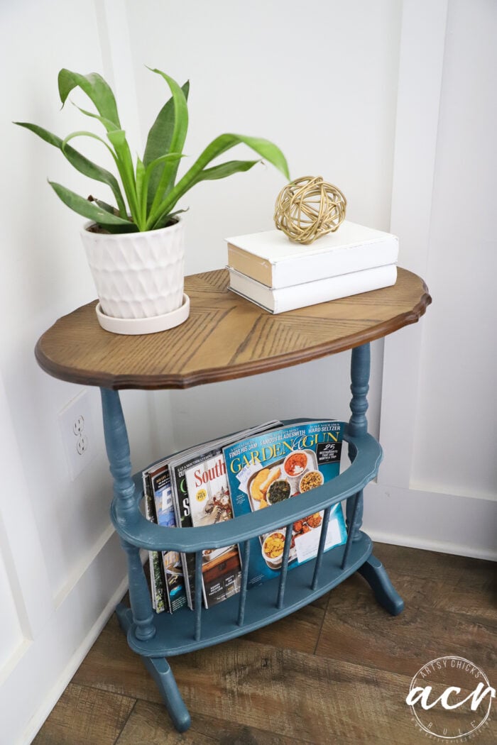 wood topped magazine table with blue base