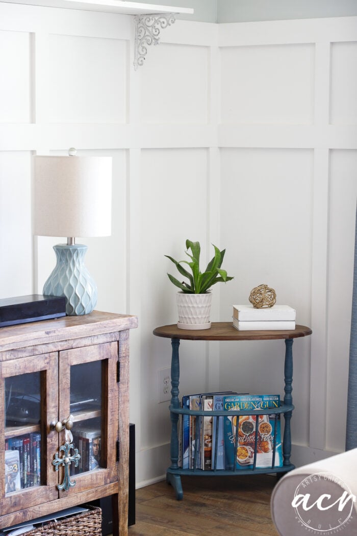 dark blue base table with stained top