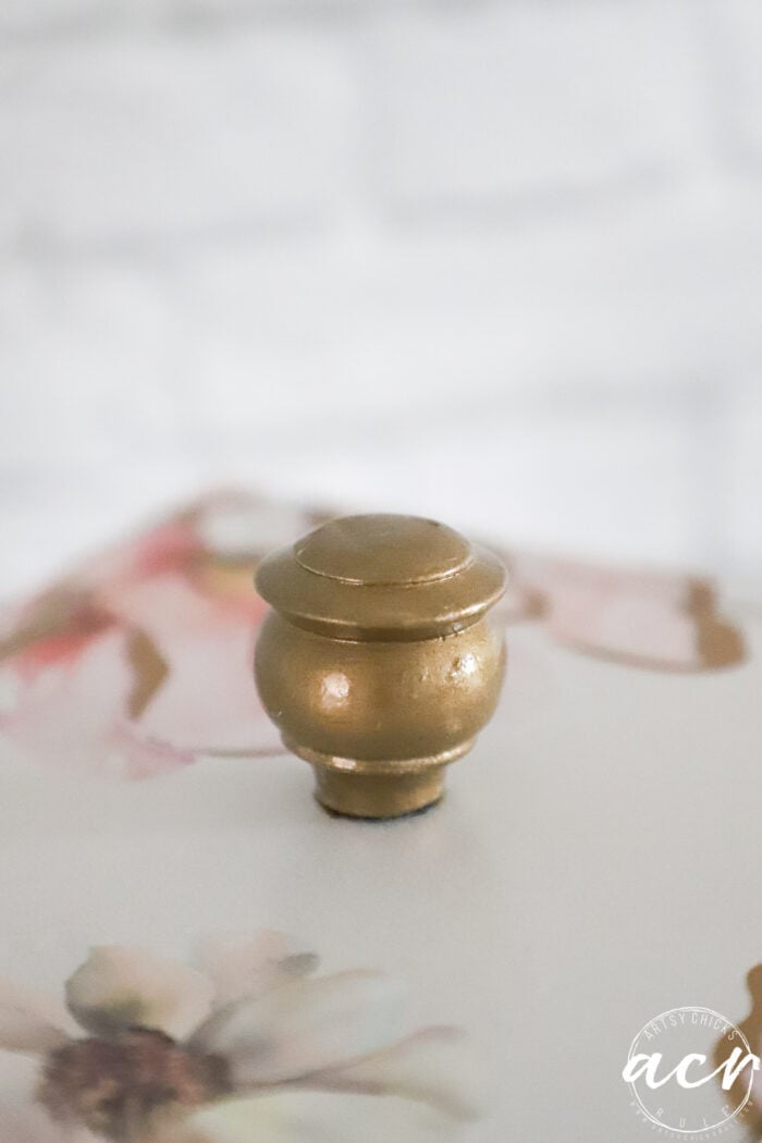 up close of knob painted gold