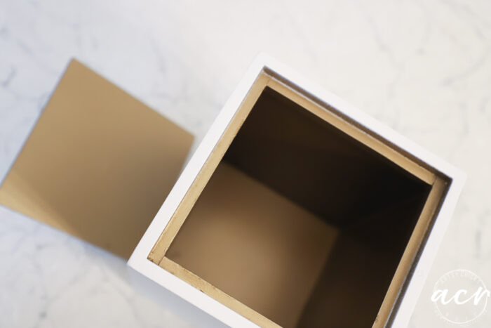 box painted gold inside