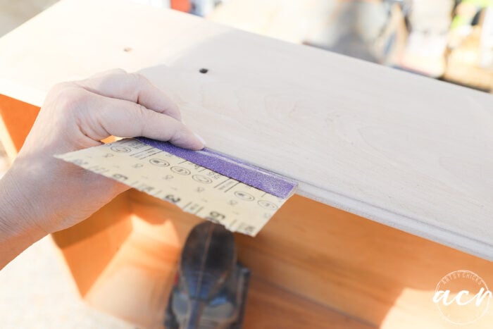 sanding the drawer crease