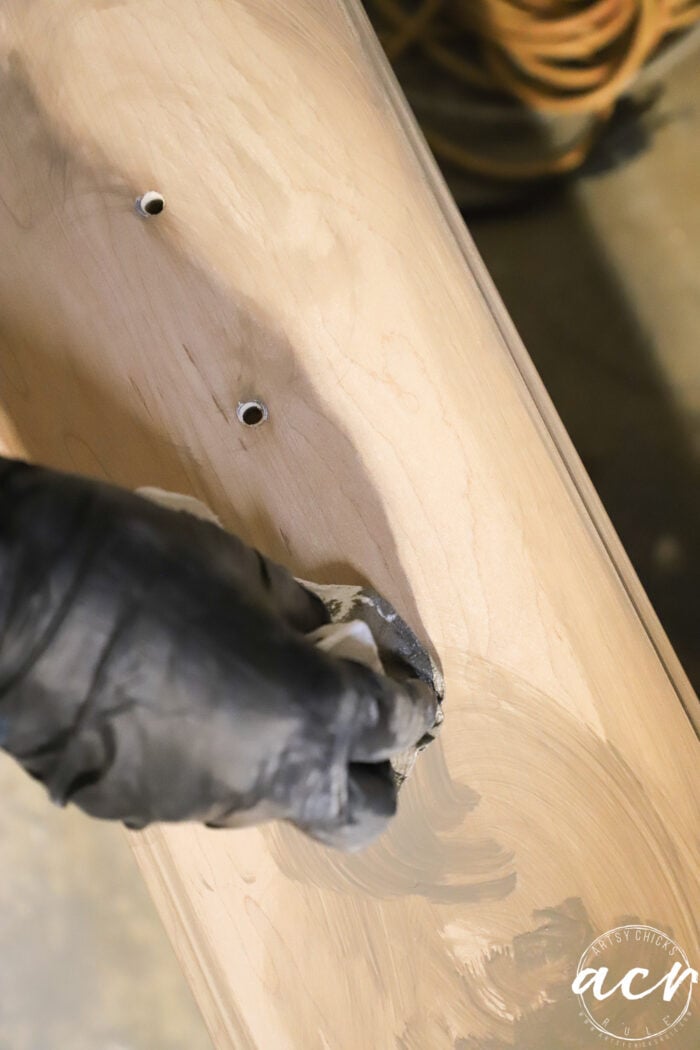 applying driftwood stain to drawer fronts