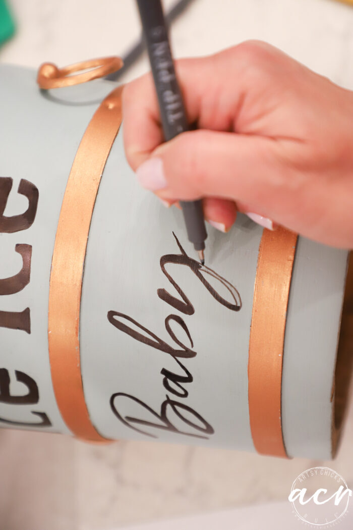 painting in the lettering with the pens