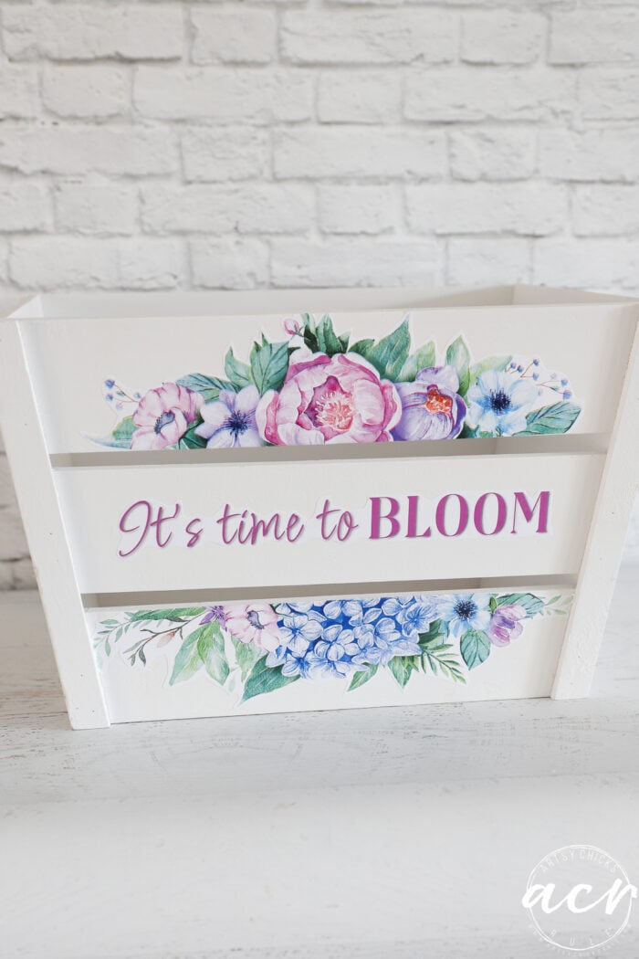 white wood create with purple and pink flowers