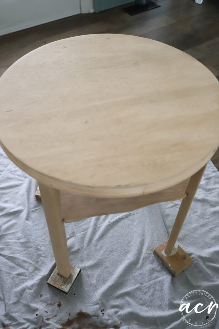 table sanded down to bare wood