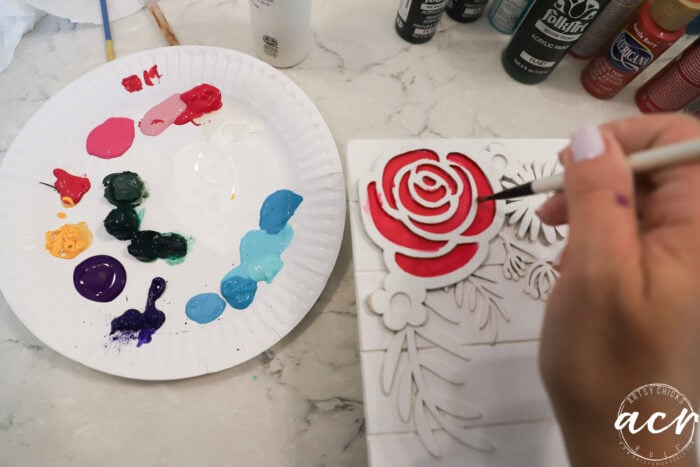 painting in flowers with craft paint