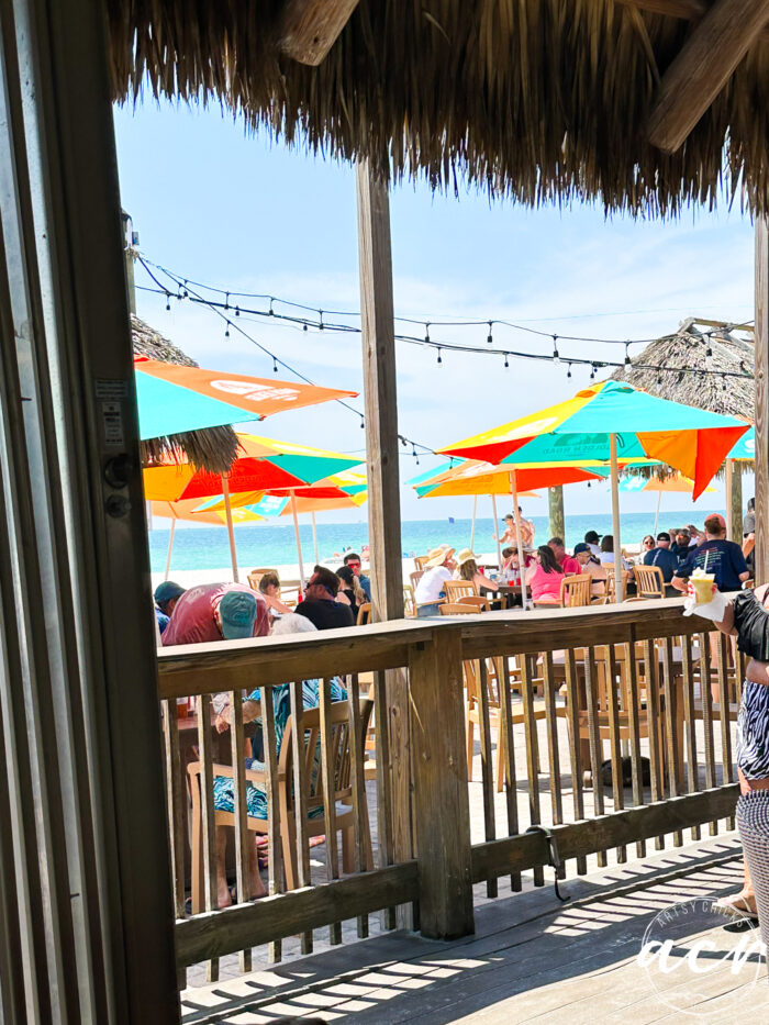 colorful umbrella tables on beach