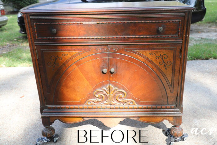 wood stained antique dresser before