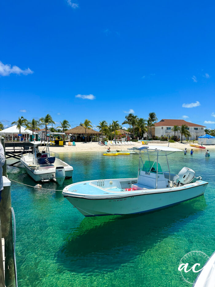 boat looks like it's floating in the clear aqua water