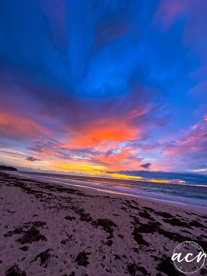 vibrant blue, orange and yellow sunrise sky