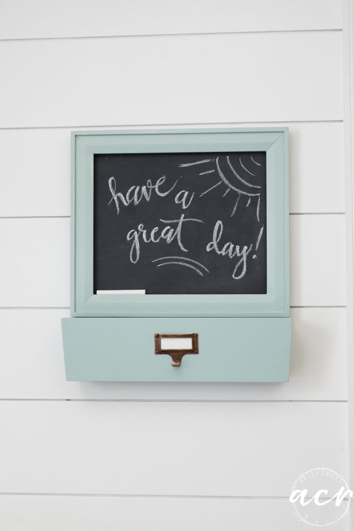 chalkboard message center on shiplap wall