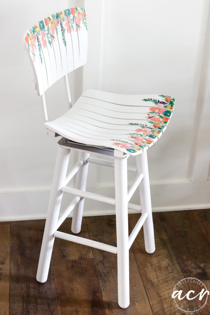 white bar stool with colorful floral napkin decoupage
