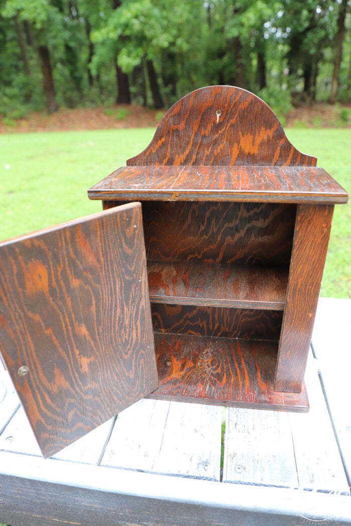 dark wood cabinet inside before