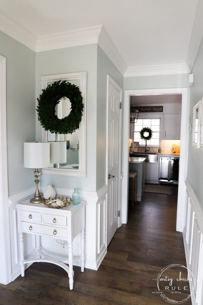 foyer with sea salt walls and white ceiling