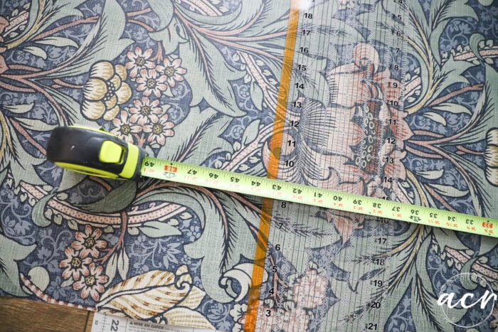 tape measure and cutting mat for paper