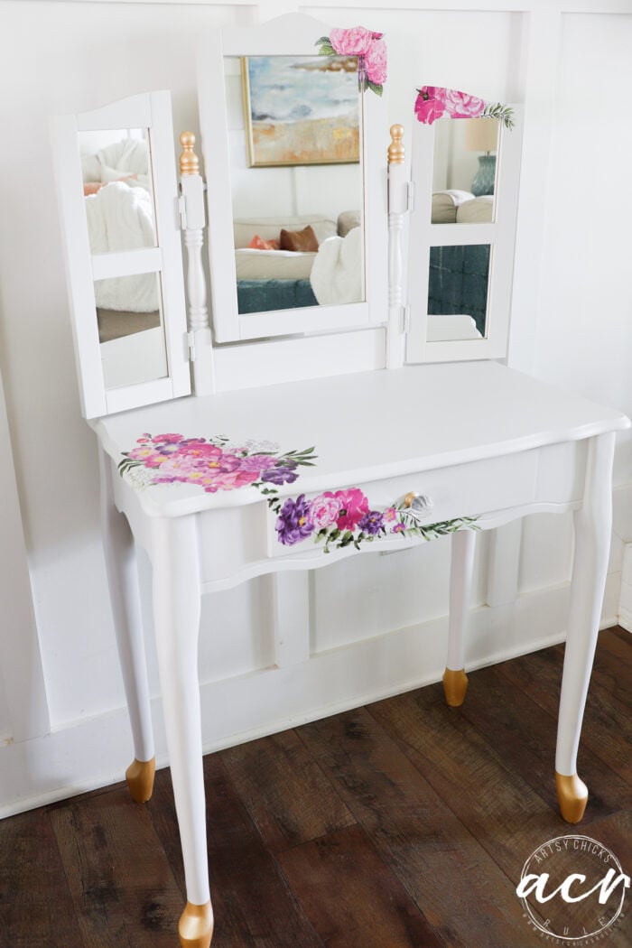 finished dressing table white with pink and purple flowers and gold feet