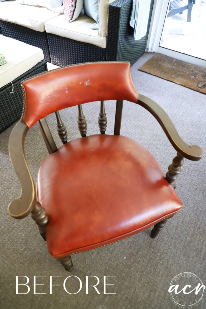 orange and wood vinyl chair on porch