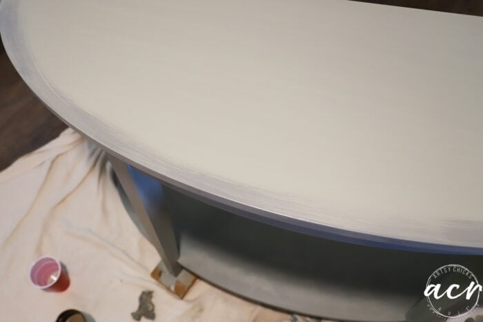 table edge showing darker paint