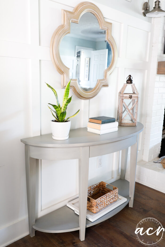 sideview of console table styled with mirror