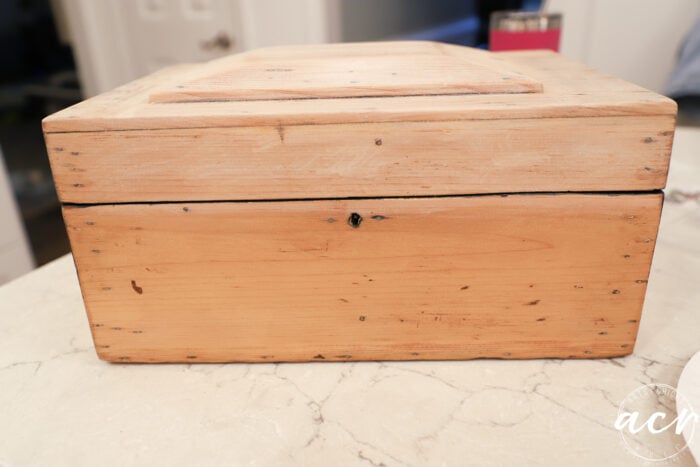 wood box with white wash on part of box