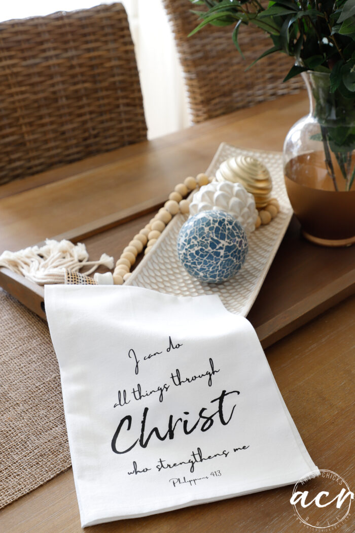 white cloth tea towel with verse on