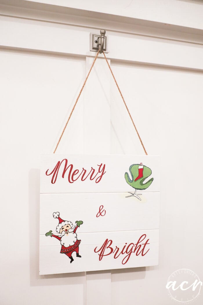 merry and bright sign hanging