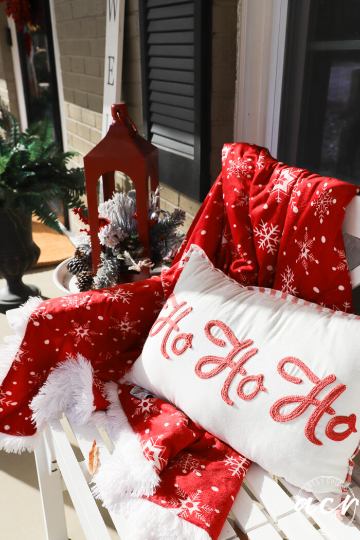 red blanket white pillow with ho ho ho