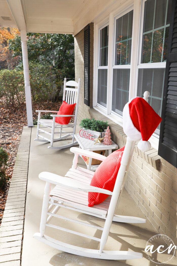 front porch white rockers red pillows