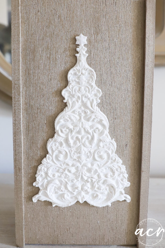 white tree on gold box