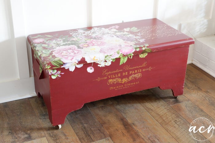 red cedar chest with floral transfer and gold french transfer