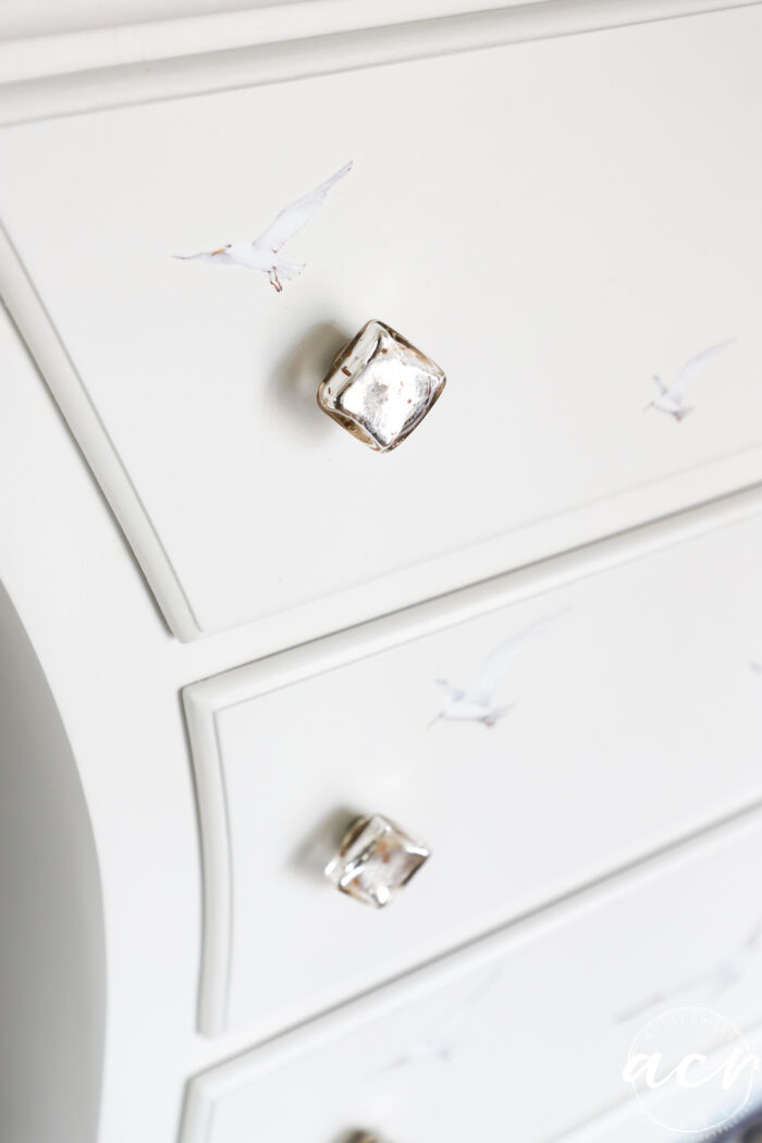 white chest with glass knobs