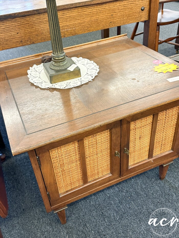 wood end table with cane doors