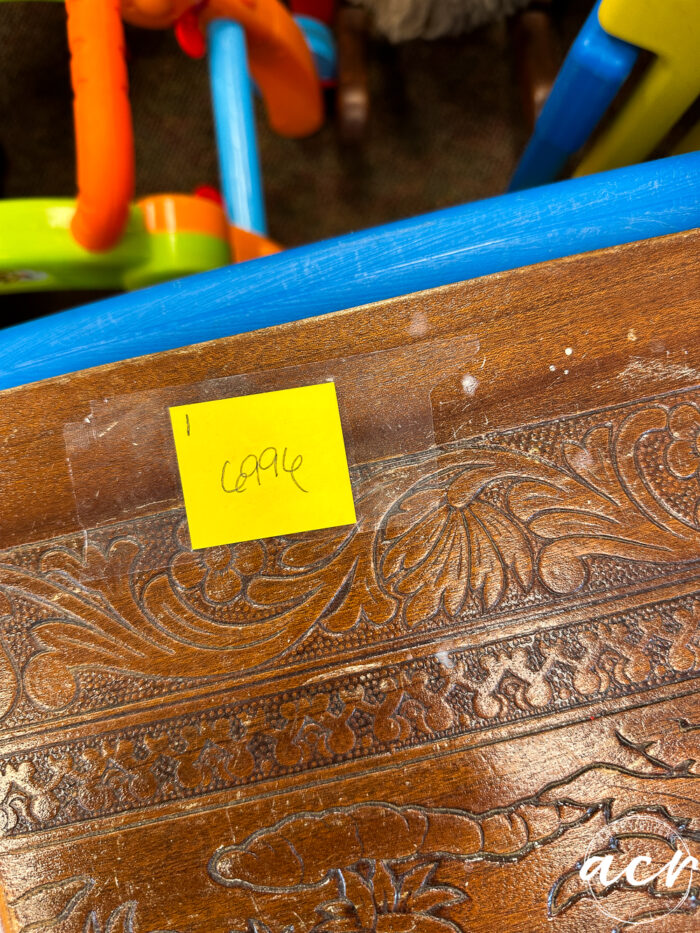 price tag on wood chest, 70