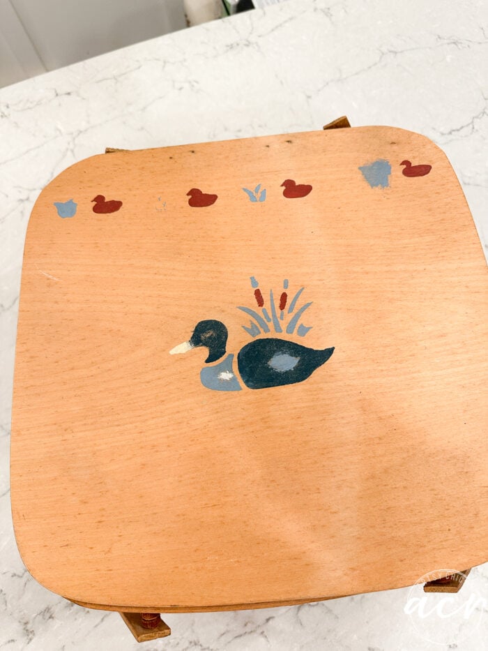 basket lid with stenciled ducks