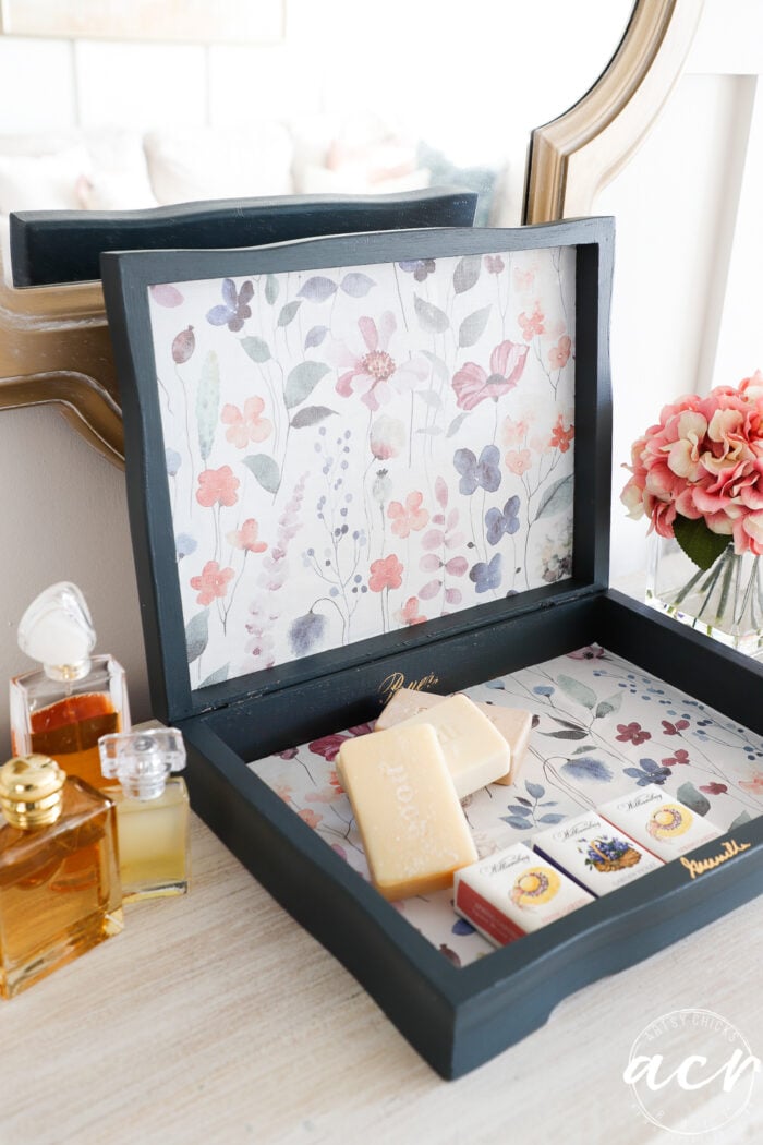 blue flatware box with floral paper inside